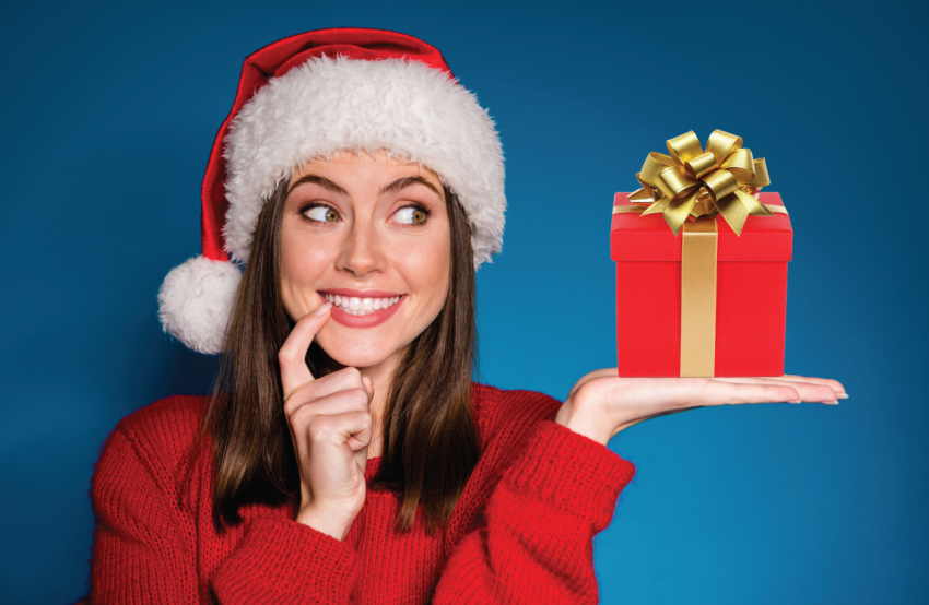 Woman wearing santa hat